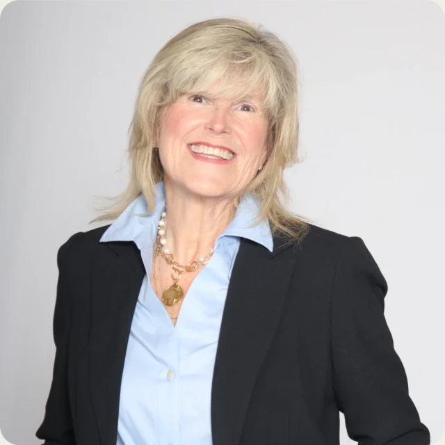 Tammy Welch, Administrative Director at Journey Church, smiling in a black blazer.