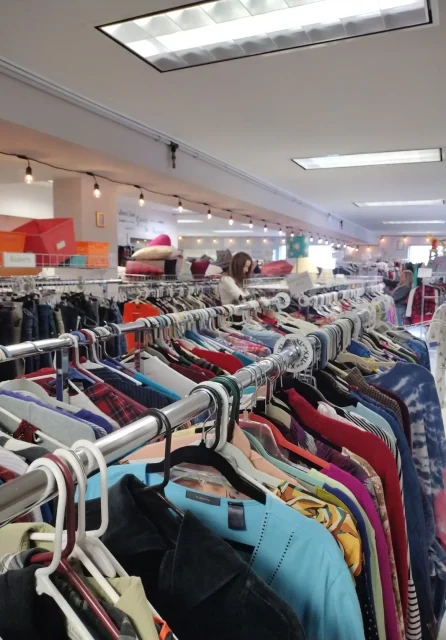 Racks of donated clothing filling the Journey Provisions shop floor